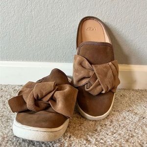 UGG slip on tennis shoes with bow detail